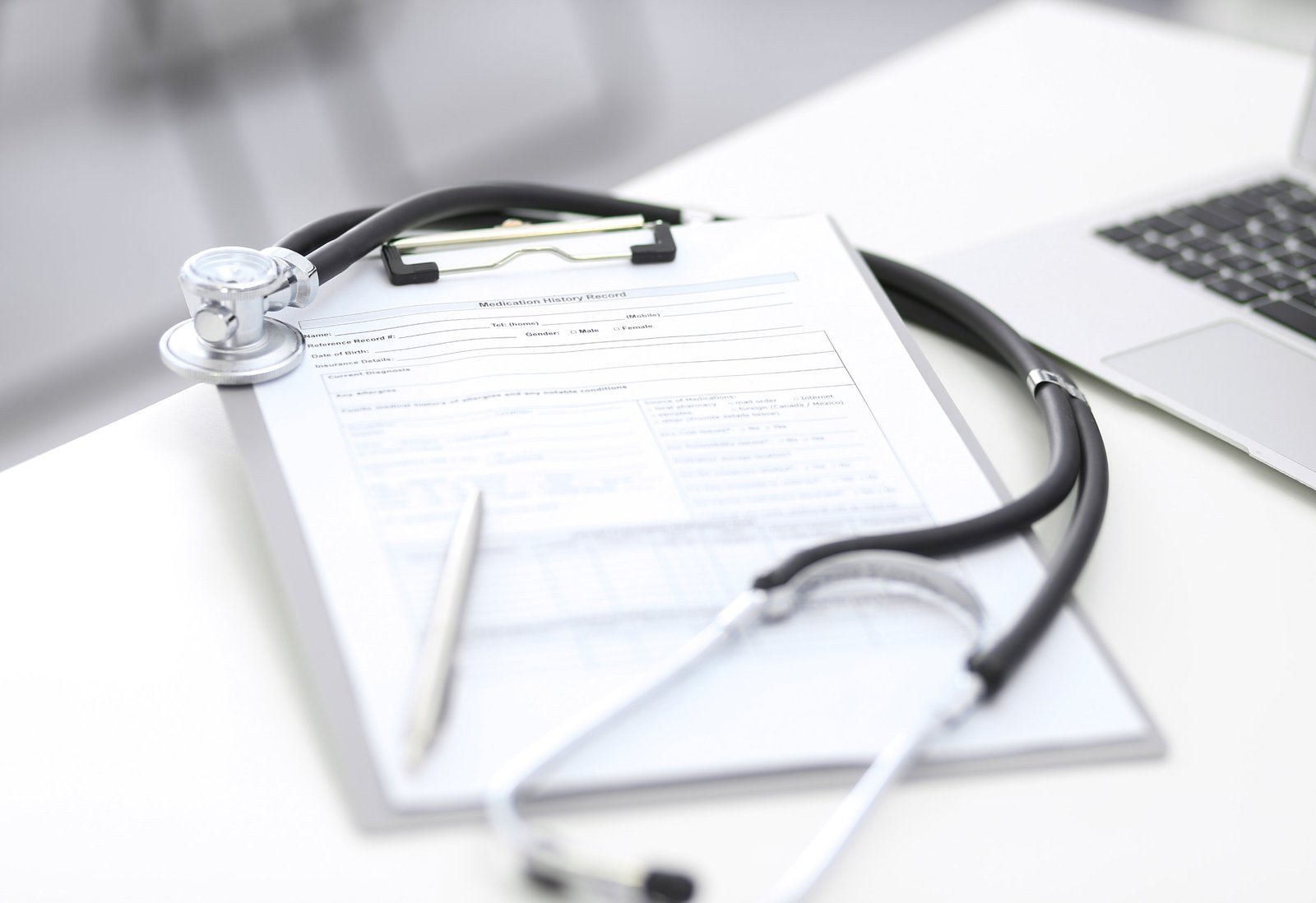 Clipboard and stethoscope representing patient records